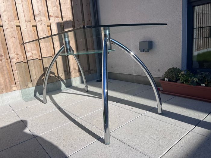 Glass and chrome dining table