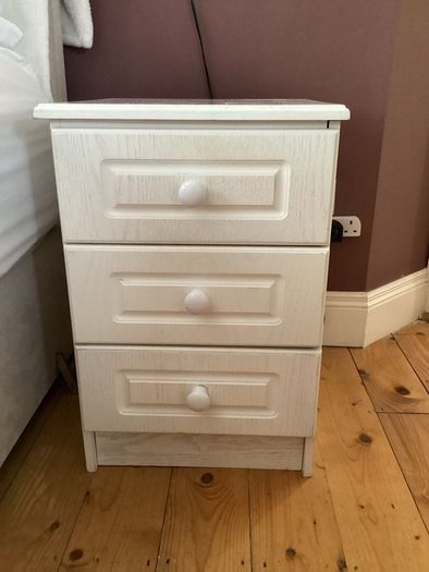 Painted light pink bedside locker