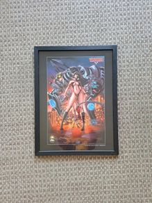 Vampirella and Cyberfrog Framed Print