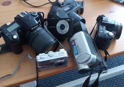 cameras - Nikon, Panasonic, Olympus