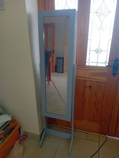 Grey freestanding jewellery cabinet with mirror