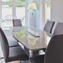 Glass-topped dining table with 6 chairs Image 3