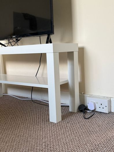 TV with Roku and Console Table