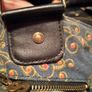 shoulder bag is from the brand Desigual. Image 9