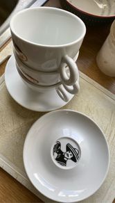 Three Cup and Saucer Sets with Cafe Silvestre Logo