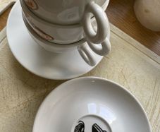Three Cup and Saucer Sets with Cafe Silvestre Logo