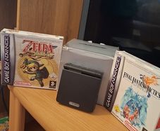 Gameboy Advance SP Boxed  , with two games.