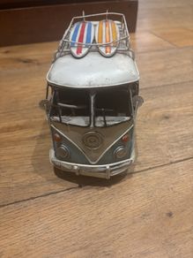 vintage Volkswagen caravan Elle with surfboard on top