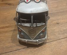 vintage Volkswagen caravan Elle with surfboard on top
