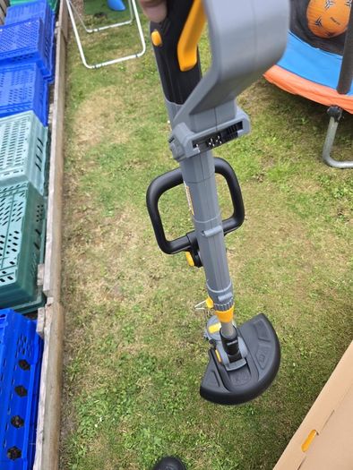Titan grass strimmer.