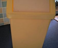 Yellow swing kitchen bin