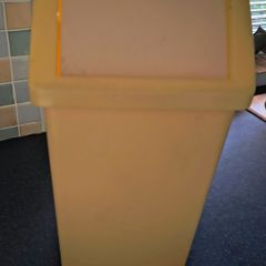 Yellow swing kitchen bin
