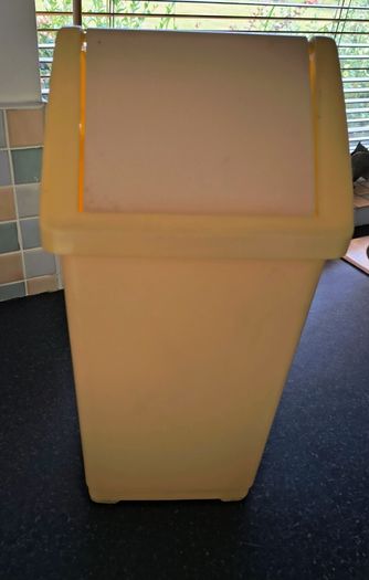 Yellow swing kitchen bin