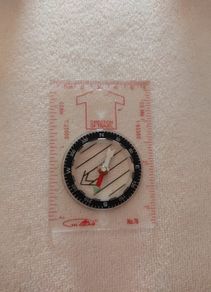 Compass with Magnifying Glass and ruler measurements