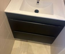 Vanity with sink and tap