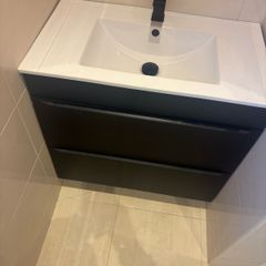 Vanity with sink and tap