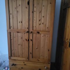 For sale: wooden Irish cabinet at a low price.