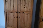 For sale: wooden Irish cabinet at a low price.