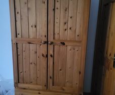 For sale: wooden Irish cabinet at a low price.