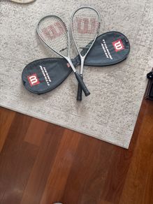 Two Wilson squash racquets