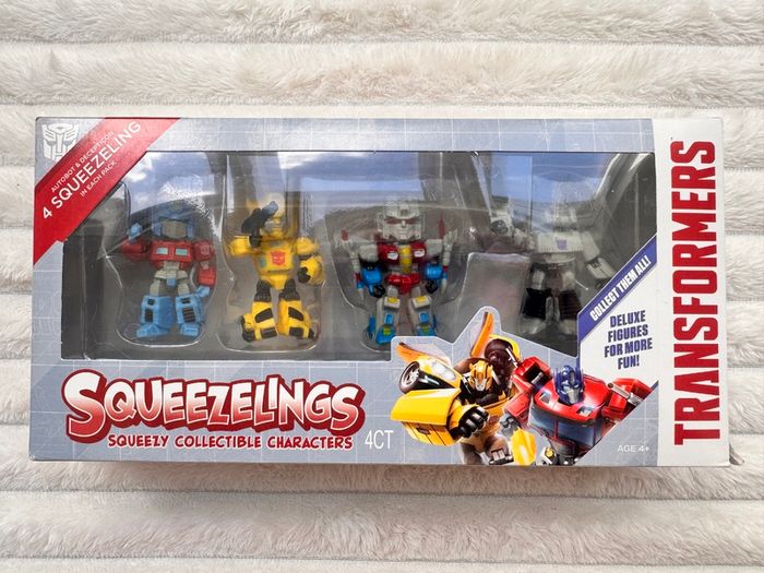 Transformers Squeezelings Squeezy Collectible Character Autobot and Decepticon Please see photos