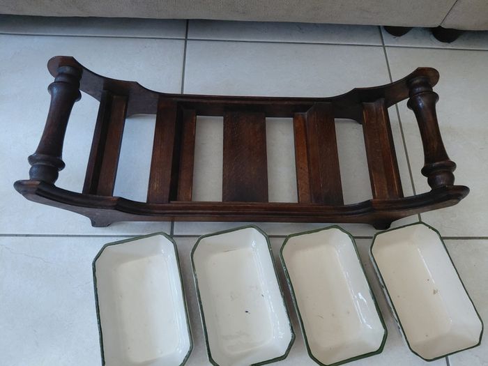 Vintage wooden serving tray with four ramekins