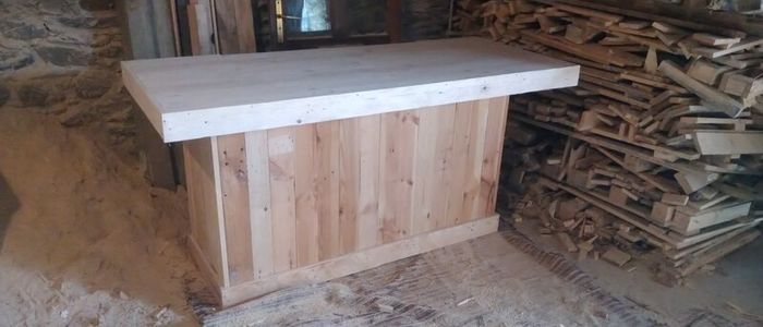 Rustic kitchen island with triple overhang