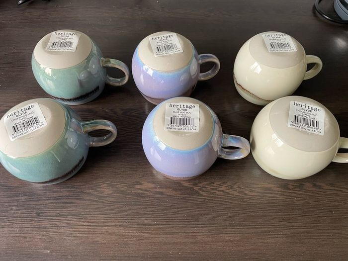 Job lot of hug mugs