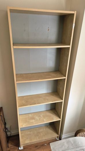 Tall light wood Bookcase