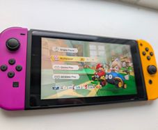 Nintendo Switch + Travel accessories + SD card + Diablo III