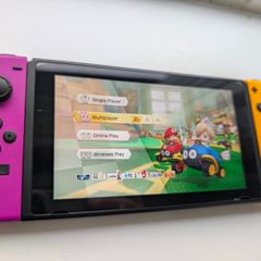 Nintendo Switch + Travel accessories + SD card + Diablo III
