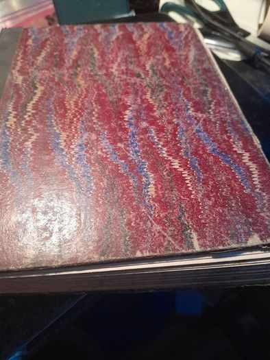 two hand written books