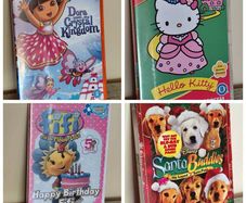 DVD Bundle Dora Fifi Hello Kitty Santa Paws