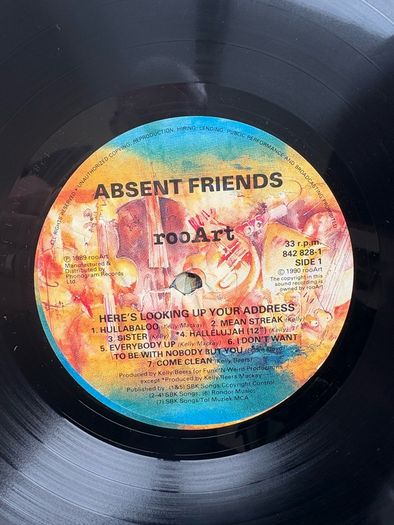 Absent Friends - Here's Looking Up Your Address. Excellent condition with inner sleeve. Successful 1990 release by Australian band - this was certified Gold, had four singles released, and made No. 7 on the Australian album charts.