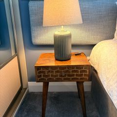 Two bedside lockers and lamps