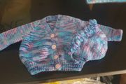 Hand knit baby jacket and bonnet