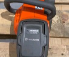 Cordless Husqvarna Chain Saw And Strimmer (bare