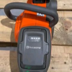 Cordless Husqvarna Chain Saw And Strimmer (bare