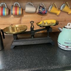 vintage weighing scales with brass weights
