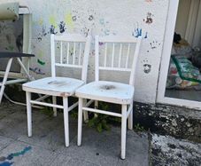 2 white chairs