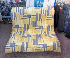 Compact double futon bed