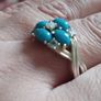 A 925 sterling silver ring with turquoise, opal, and topaz. Image 4