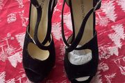 Brand new black high heels in UK size 5