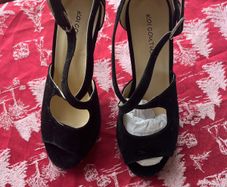 Brand new black high heels in UK size 5