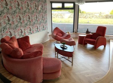 Living room / Sunroom couch and arm chairs red