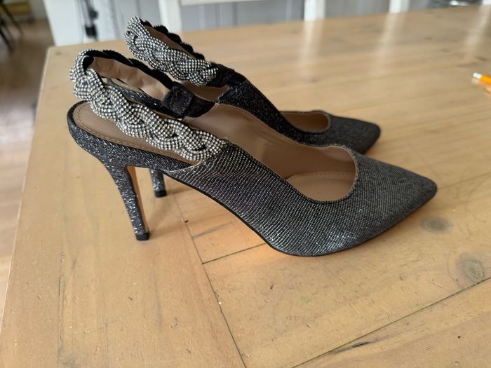 High heels, New. Size 6 black with sparkles and diamond ankle strap