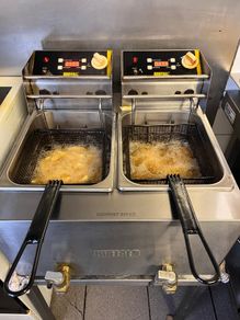 Buffalo commercial double deep fryer.