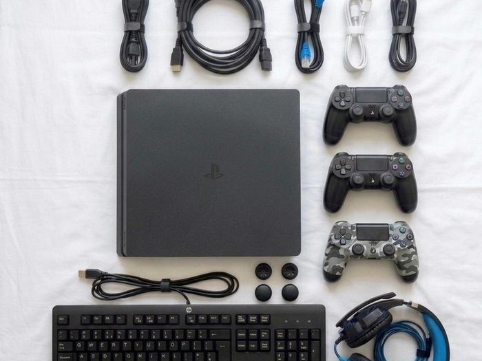 PS4 slim 500 GB with 2 controller & all essential accessories included
