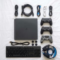 PS4 slim 500 GB with 2 controller & all essential accessories included