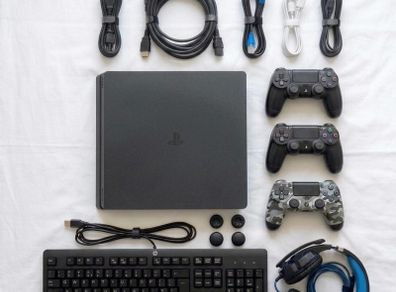 PS4 slim 500 GB with 2 controller & all essential accessories included